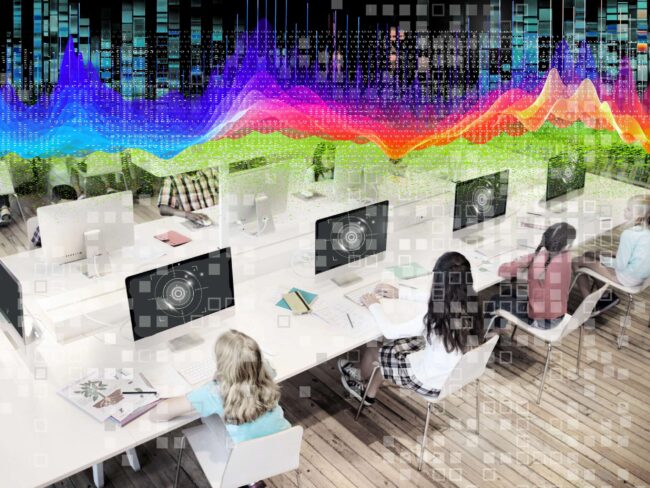 Students sat in front of computers with colourful AI streams behind